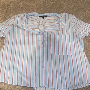 Short sleeve light blue shirt with red stripes.